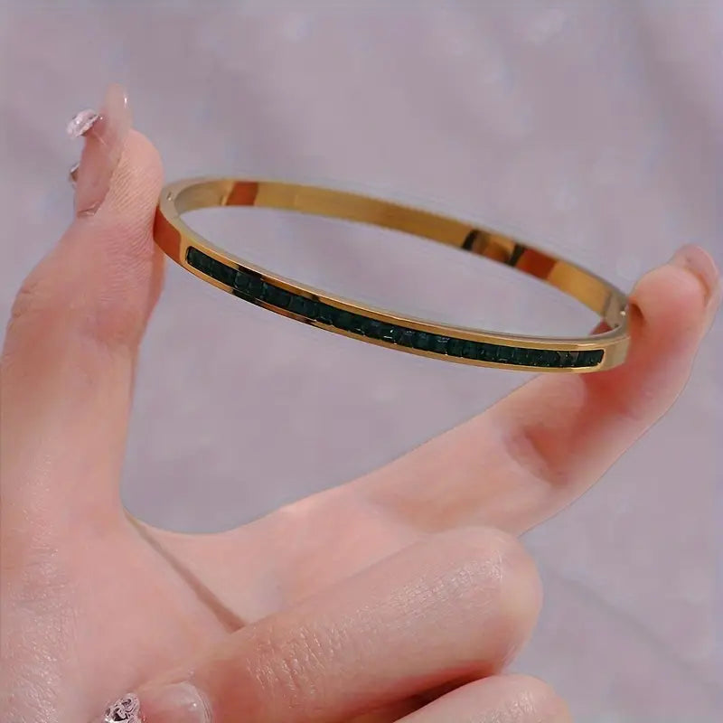Gold Bracelet with Green Stones