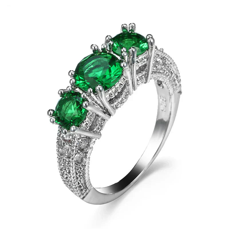 Timeless Emerald Ring with Sparkling Stones