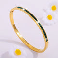 Gold Bracelet with Green Stones