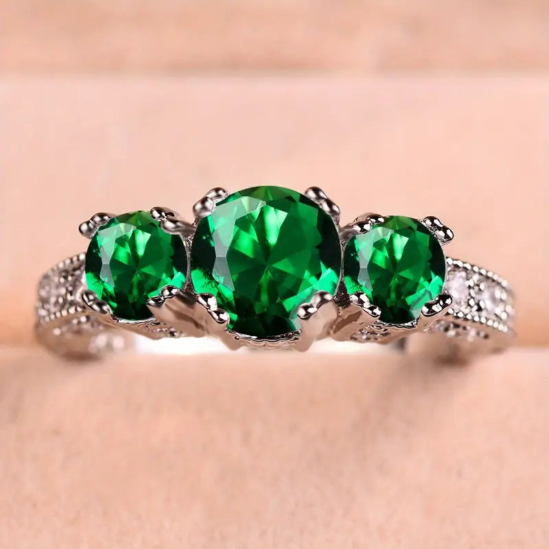 Timeless Emerald Ring with Sparkling Stones